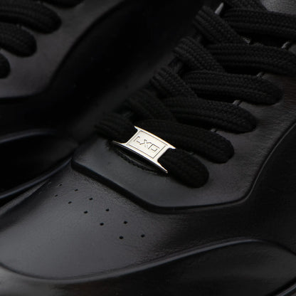 L'EXUDE PurNoir height-increasing elevator casual shoes, color black, shown in a close-up view