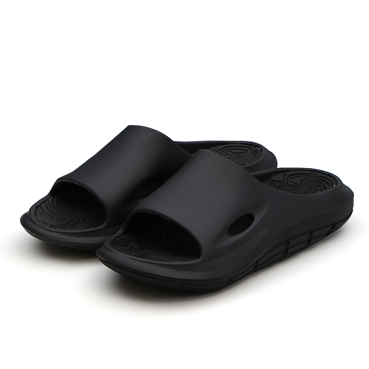 L'EXUDE RAPTOR height-increasing elevator slippers, color black, shown in a perspective view