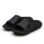 L'EXUDE RAPTOR height-increasing elevator slippers, color black, shown in a perspective view